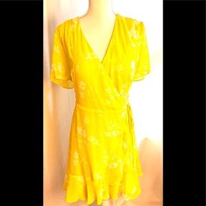 Beautiful yellow very flattering wrap dress